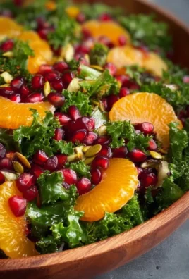 Citrus Pomegranate Kale Salad with vibrant ingredients in a bowl