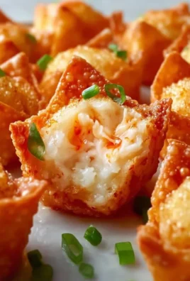 Crispy Crab Rangoon Bombs filled with cream cheese, served as an appetizer