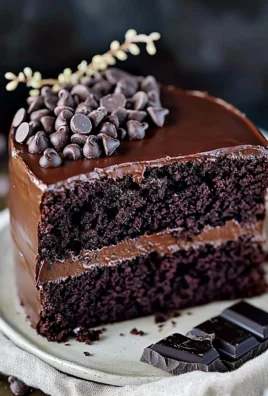 Deliciously rich Dark Chocolate Fudge Cake topped with chocolate ganache.