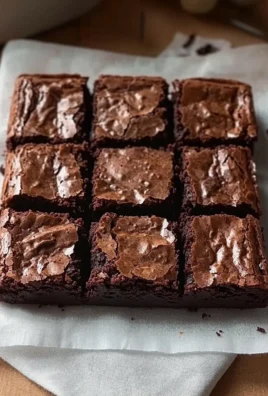 Delicious fudgy brownies fresh from the oven, rich and chocolatey treat.