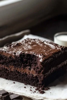 Delicious chocolate fudge cake recipe by Ina Garten ready to serve