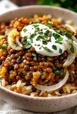 Plate of mujadara, a traditional Middle Eastern dish with lentils and rice.