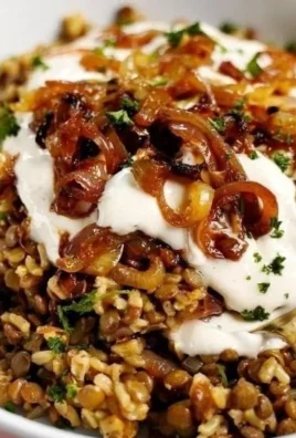 Mujadara dish featuring lentils, rice, and caramelized onions