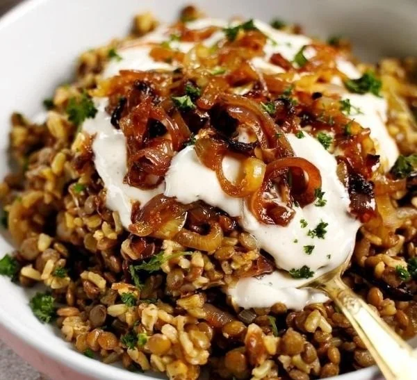Mujadara dish featuring lentils, rice, and caramelized onions