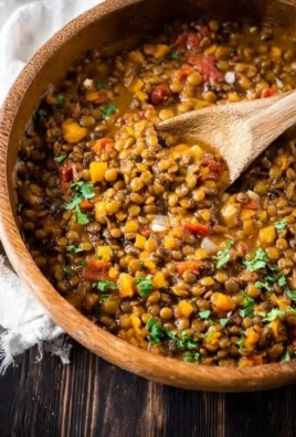 One Pot Mexican Lentils served in a bowl with fresh herbs and spices