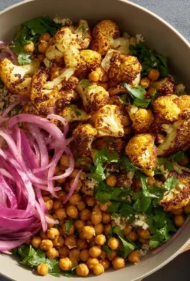 Roasted cauliflower salad with tahini, chickpeas, and pearl couscous