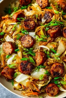 Colorful Sausage and Cabbage Stir Fry served in a bowl