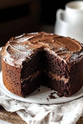 Delicious small chocolate cake with rich frosting and decoration