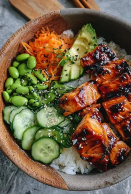 Delicious teriyaki salmon sushi bowl with sticky glaze and fresh ingredients