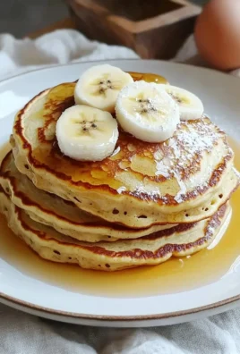 Fluffy 3 ingredient banana pancakes stacked on a plate