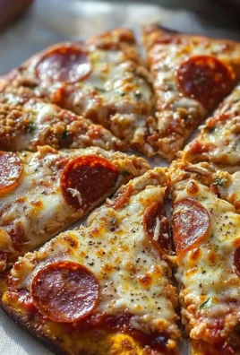 Delicious Chicken Crust Pizza slice with toppings on a wooden plate