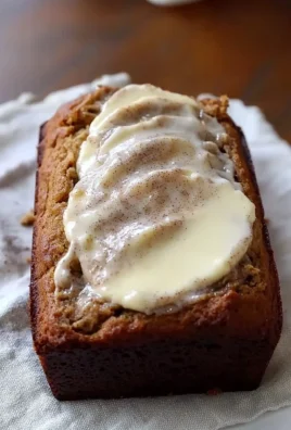 Delicious cinnamon roll banana bread with cinnamon swirl topping