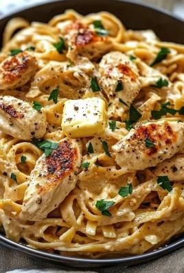 Creamy Cowboy Butter Chicken Pasta served in a bowl garnished with herbs