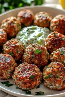 Greek Turkey Meatballs with Tzatziki Sauce on a plate