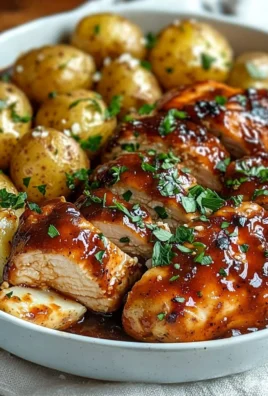 Honey BBQ Chicken with Garlic Parmesan Potatoes on a plate