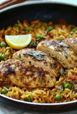 Delicious One Pan Mediterranean Chicken with rice and vibrant vegetables