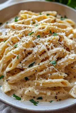 One Pot Creamy Garlic Pasta served in a bowl with parsley garnish