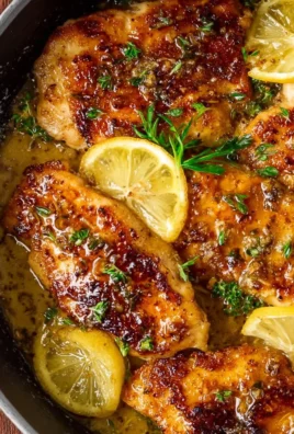 Quick and easy lemon chicken dish garnished with fresh herbs