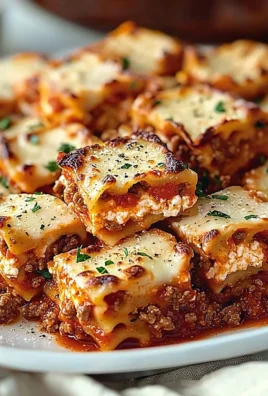 A plate of slow cooker lasagna showcasing layers of noodles, cheese, and sauce.