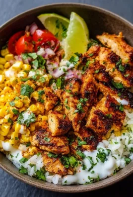 Delicious Street Corn Chicken Rice Bowl with grilled chicken, corn, and spices.