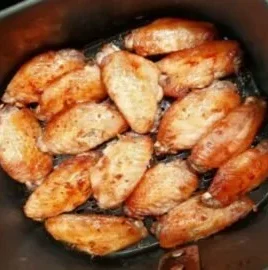 Crispy Air Fryer Chicken Wings plated with dipping sauces