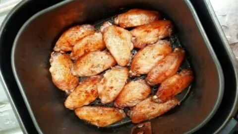 Crispy Air Fryer Chicken Wings plated with dipping sauces