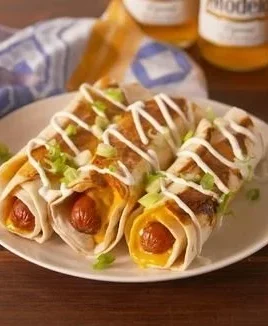 Delicious cheesy hotdogs with melted cheese and crispy toppings