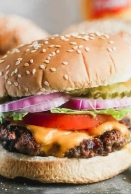 Delicious classic juicy hamburger served with fresh toppings