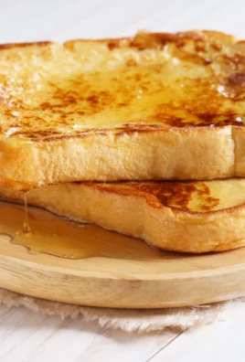 Gordon Ramsay's French toast recipe served with syrup and berries