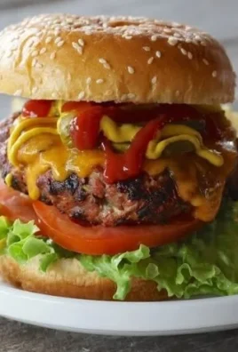 Delicious homemade burgers with fresh toppings on a wooden table