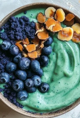 Delicious Ocean Smoothie Bowl topped with blue spirulina and fresh fruits