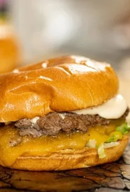 Delicious homemade smash burger on a plate with toppings