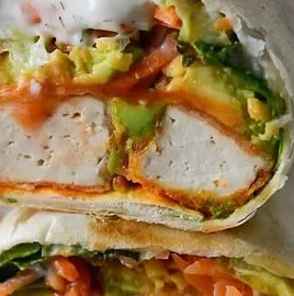 Buffalo Tofu Wrap with Easy Vegan Ranch served on a plate