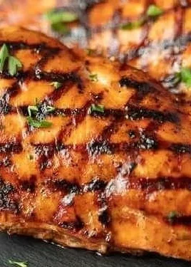 Delicious Catalina Grilled Chicken served with fresh herbs and vegetables