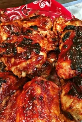 Cherry Dr Pepper BBQ Chicken on the grill with a tangy glaze