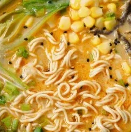 Bowl of easy vegan spicy miso ramen with vegetables in a one-pot dish