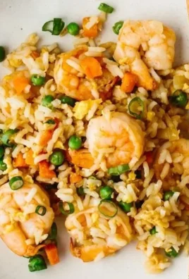 Plate of easy shrimp fried rice with vegetables and shrimp