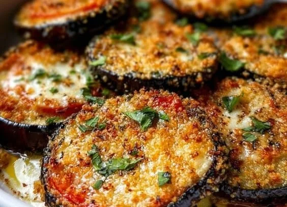 Delicious homemade Eggplant Parmesan with layers of cheese and marinara sauce.