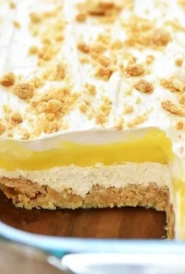 Delicious Oreo Lemon Dessert with creamy layers and zesty lemon topping