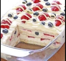No Bake Summer Berry Icebox Cake with fresh berries and whipped cream layers