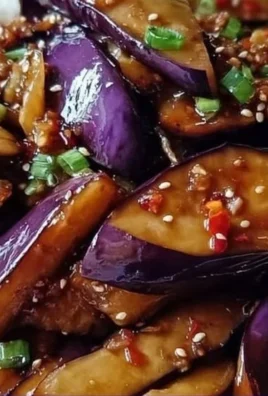 Delicious sautéed Chinese eggplant in garlic sauce served in a bowl