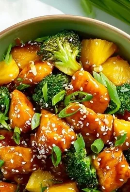 Teriyaki chicken with pineapple and broccoli on a sheet pan