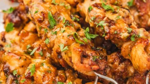 Crispy Air Fryer Bang Bang Chicken garnished with green onions