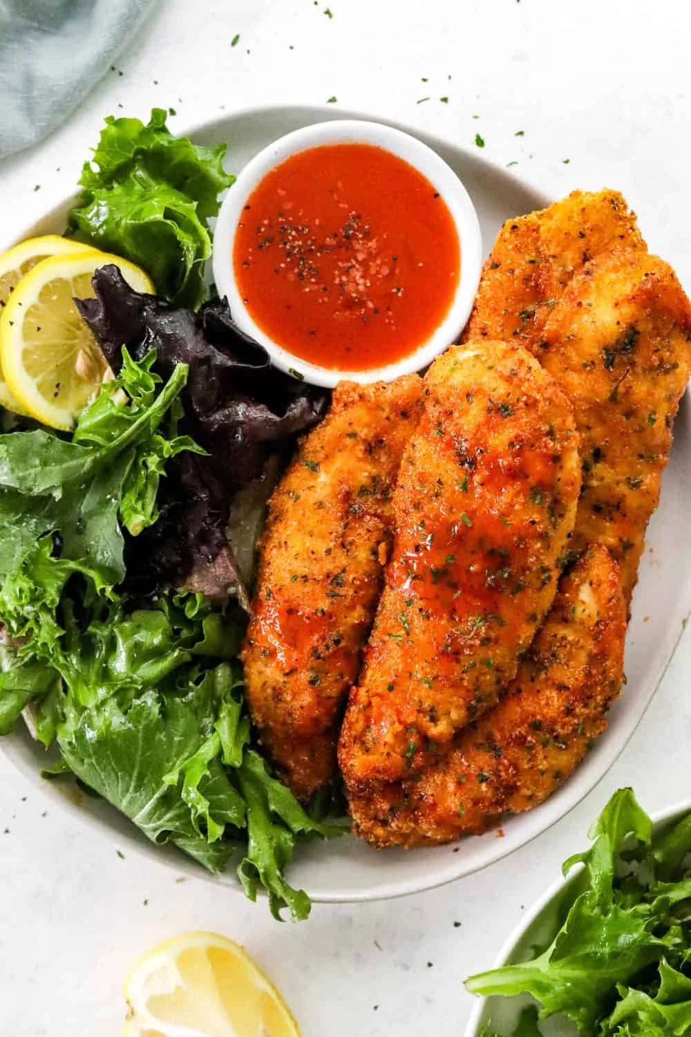 Plate of low-carb gluten-free air fryer chicken tenders