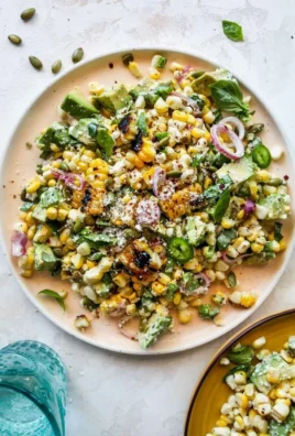 Colorful Avocado Corn Salad served in a bowl, perfect for parties and gatherings.