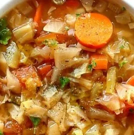Healthy homemade cabbage soup served in a bowl, ideal for diet and weight loss.