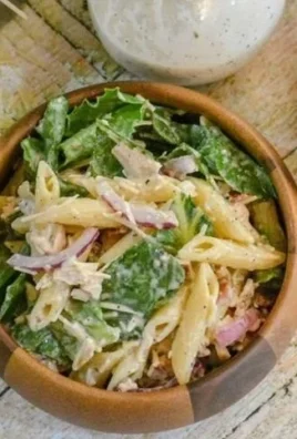 Delicious Chicken Caesar Pasta Salad with fresh ingredients and dressing