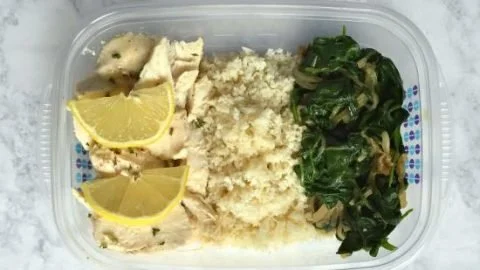 Healthy chicken meal with cauliflower and spinach on a plate