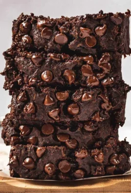 Loaf of chocolate zucchini banana bread with chocolate chips
