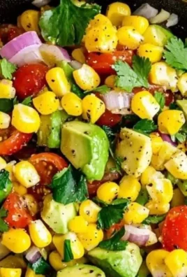 Delicious Corn Tomato Avocado Salad served in a bowl